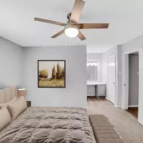 A living room with a ceiling fan