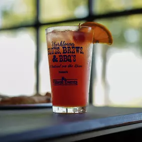 The Yorktown Sunset — Water Street Grille’s tropical crowd-pleaser featuring layers of fruit flavor and a striking sunset hue.