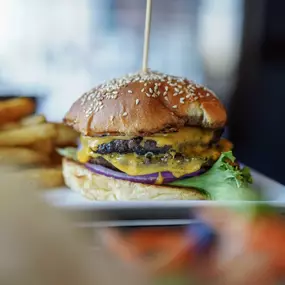 The WSG Burger — Water Street Grille’s signature half-pound burger stacked with classic fixings and bold house-made sauce.