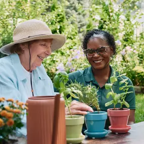Care Professional and client gardening