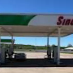 Sinclair gas station fueling island.