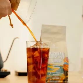 Lionrush Coffee iced Ethiopian Sunrise pouring into a glass with ice