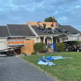 Professional roofing crew from Best Construction, Inc. completing a full tear-off and re-roof in Dover, DE.