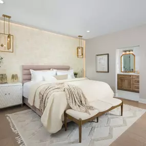 Luxurious primary bedroom with attached en suite bathrooms