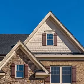 Energy-efficient windows installed in a custom gable design.