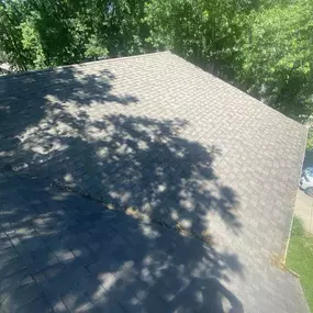 Completed shingle roofing installation on a residential home.