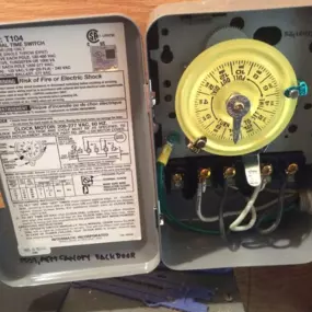 Precision-installed mechanical timer box by My Electrician allows for energy-saving control of electrical systems.
