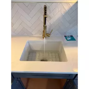 This stylish and fully functional kitchen faucet installation is another clean finish by Just Plumbing, Inc.