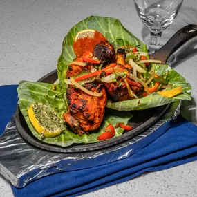 Flavorful Tandoori Chicken, marinated in Indian spices and grilled fresh at our Oviedo Indian food restaurant.