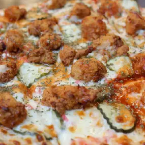 Artisan crust, roasted red bell pepper dip, dill pickles, spicy marinated fried chicken & topped with honey sriracha.