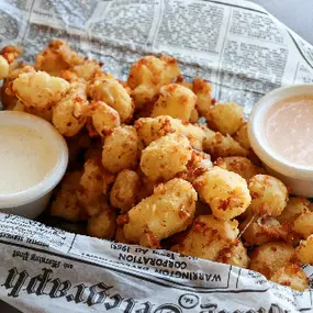 Lightly battered and golden fried. Served with ranch & sriracha ranch.