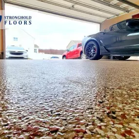 Transformed this tired concrete into a sleek, durable epoxy garage floor. Perfect for Maryland homeowners seeking “garage epoxy flooring near me.”