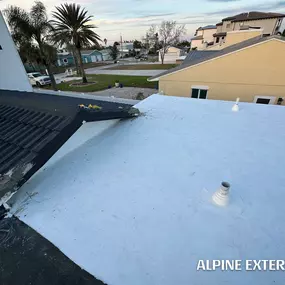 Flat EPDM rubber roof Alpine Exteriors.