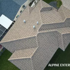 Tile roof installation Alpine Exteriors.