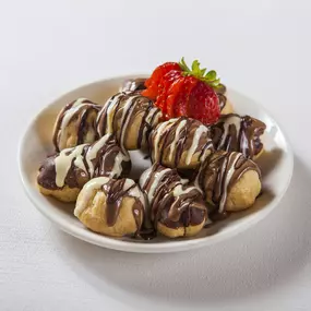 cream puff bites with milk and white chocolate