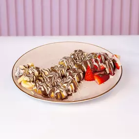 Build your own mini pancakes with Belgium white and milk chocolate and strawberies
