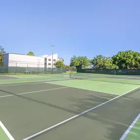 The tennis court at Orbit One Vacation Villas