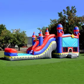 Rocket Lane Combo Bounce House with Dual Slide
A vibrant inflatable castle combo with red, blue, and grey colors featuring dual slides and a splash pool. Perfect for parties, school events, and festivals.