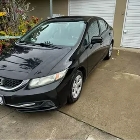 Freshly detailed black Honda Civic with a deep, mirror-like shine and spotless finish, highlighting Ozzie’s Mobile Detailing’s professional exterior car detailing services in Long Beach, CA.