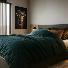 Rendering: Bett des Businessapartments Stayurban Large im Schlafbereich