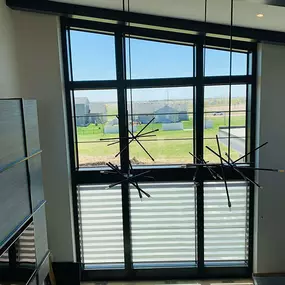 Transitional shades also known as Zebra shades are a great way to add style and light control to any interior.  These can be automated for added convenience on taller windows.