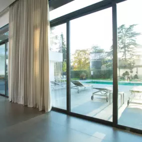 Upgrade to smart living with motorized window treatments. Control your blinds, shades, and drapes with a remote, app, or voice assistant—for everyday comfort, made effortless.
