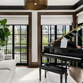 Sheer shades filter natural light into a soft ambiance and bring understated elegance to summer interiors.