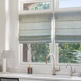 Elevate your space with classic Roman shades. Soft folds, elegant lines, and versatile fabric options to match any décor.