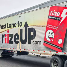 Advertisement on the side of a tractor trailer from semi serious ads, mobile billboard advertising.