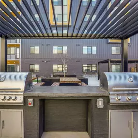 Two outdoor grills and pavilion.