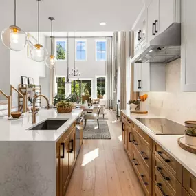 The open-concept kitchen flows effortlessly into the casual dining area and great room, perfect for entertaining