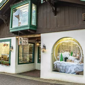 Storefront of Hansel and Gretel Candy Kitchen with their sign in view, in Helen Ga