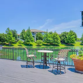 Lake doc with table and chairs overlooking the lake
