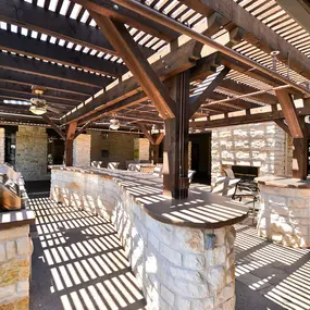 Outdoor grilling area with stone countertops