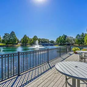 Deck with chairs overlooking the community lake
