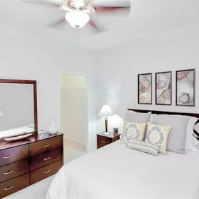Walk in closet through bedroom