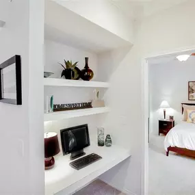 Office set up with bedroom next to it