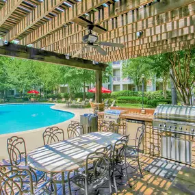 Outdoor grilling station with shady covering