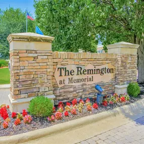 Property entrance with stone sign