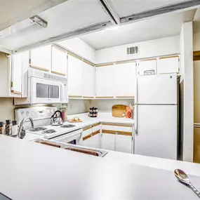 Kitchen with white appliances