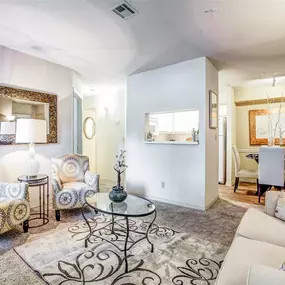 Living Room with a couch and chairs