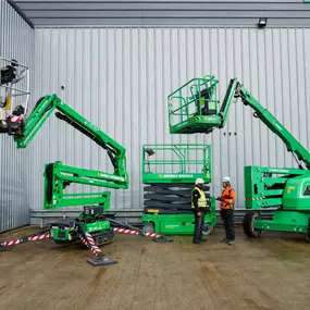 Sunbelt Rentals branded powered access equipment including boom lifts and scissor lifts.