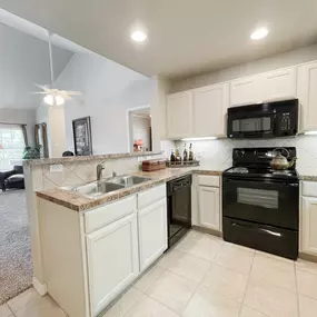 View of kitchen with stainless steel sink
