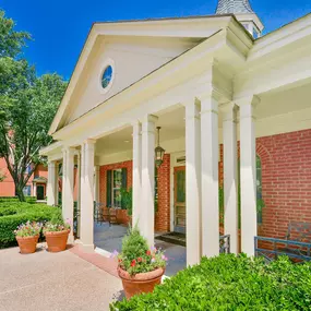 Leasing office entrance with plants