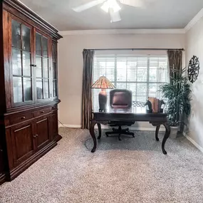 Office set up with beige carpeting