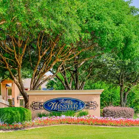 Property signage with trees