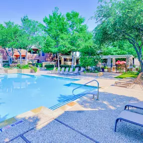 Pool with sundeck and lounge chairs