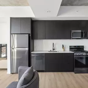 Kitchen with black cabinetry