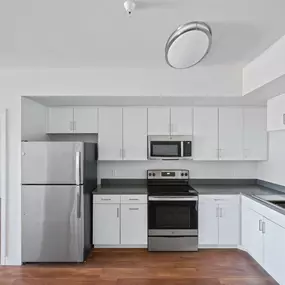 Kitchen with sink and white cabinetry