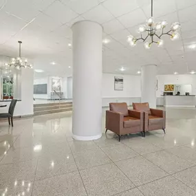 A Spacious Lobby With a Chandelier